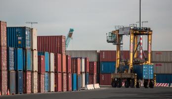 Shipping containers on dock.